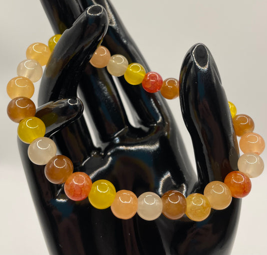 Fall colored 8mm glass bead stretch bracelet. 7”