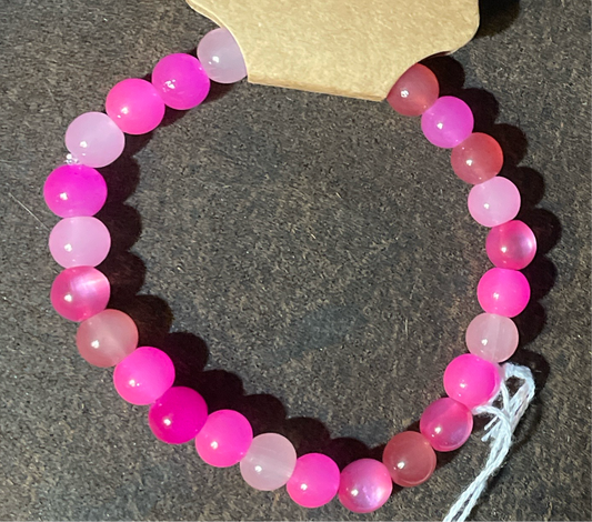 Multicolored Pink hues 8mm glass bead stretch bracelet. 7”