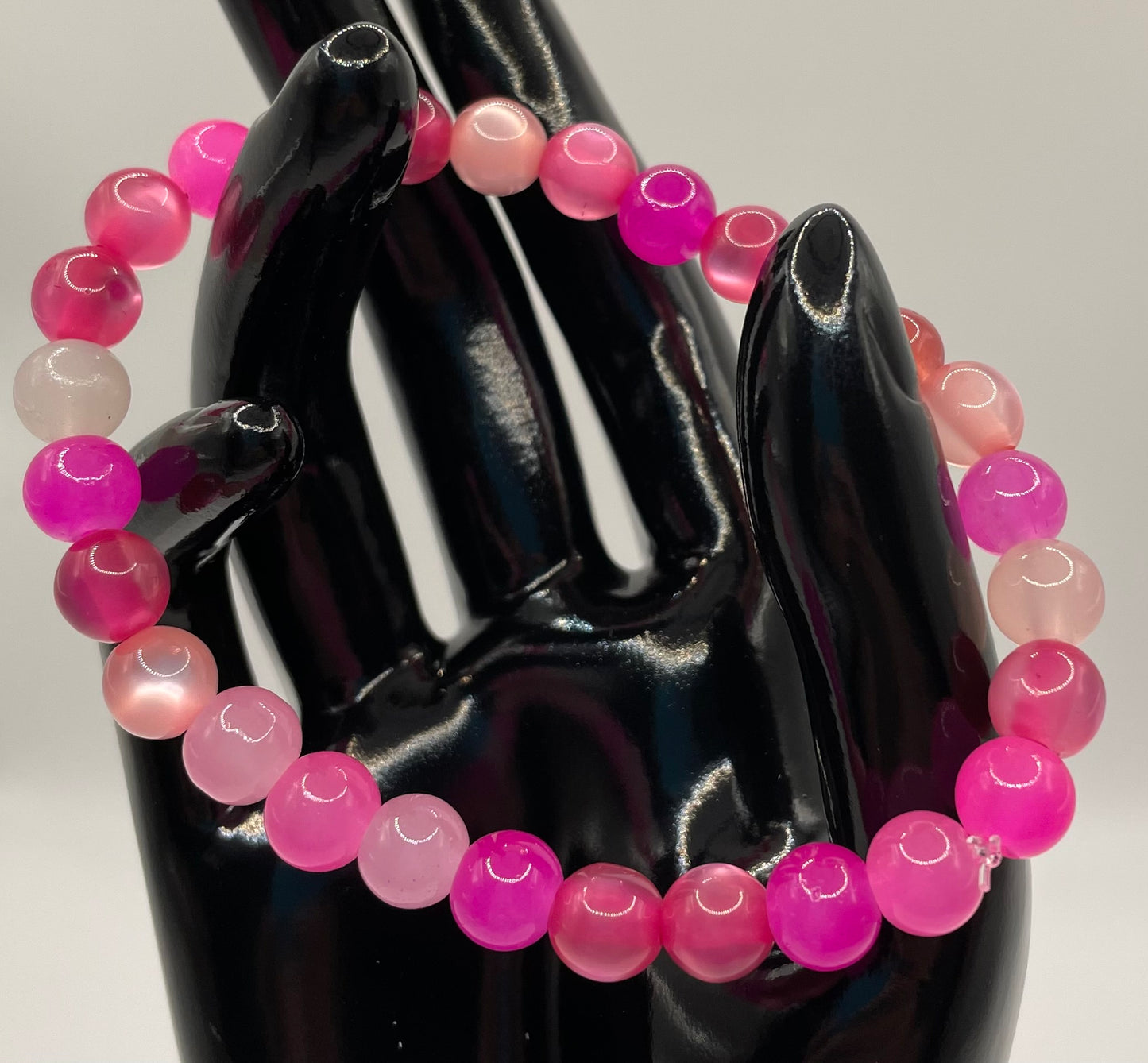 Multicolored pink hued 8mm glass bead stretch bracelet. 7.5”