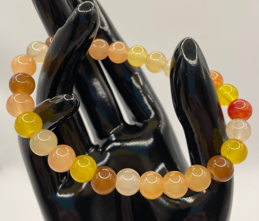 Fall color 8mm glass bead stretch bracelet. 7.25”