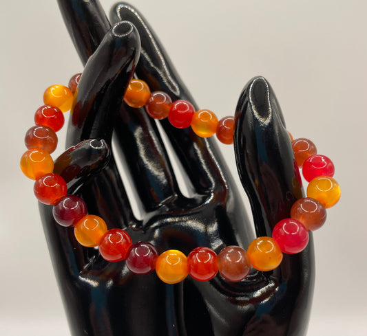 Multi fall colored glass bead stretch bracelet. 7”