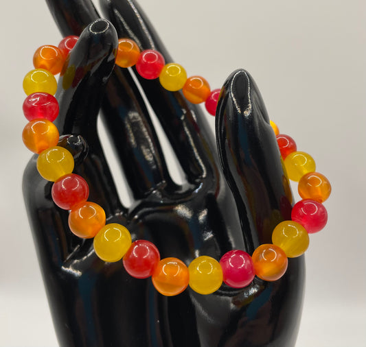 Multi fall color 8mm glass bead stretch bracelet. 7”