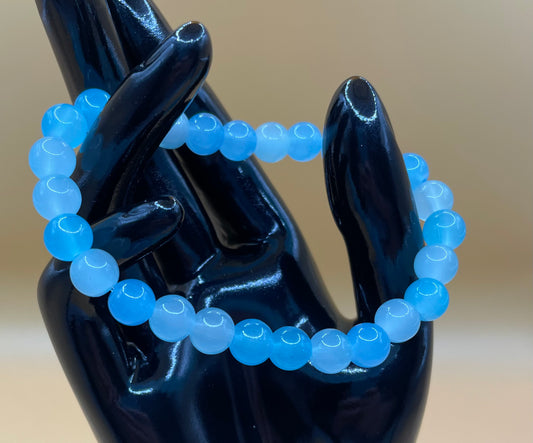 Blue glass bead stretch bracelet. 7”