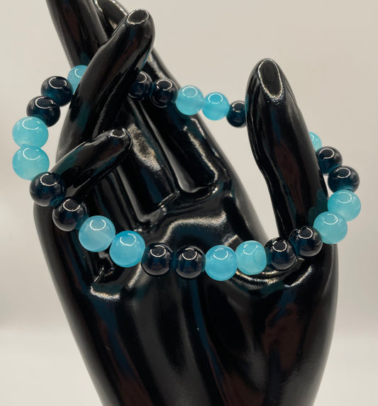 Light & dark blue 8mm glass bead stretch bracelet. 7.5”